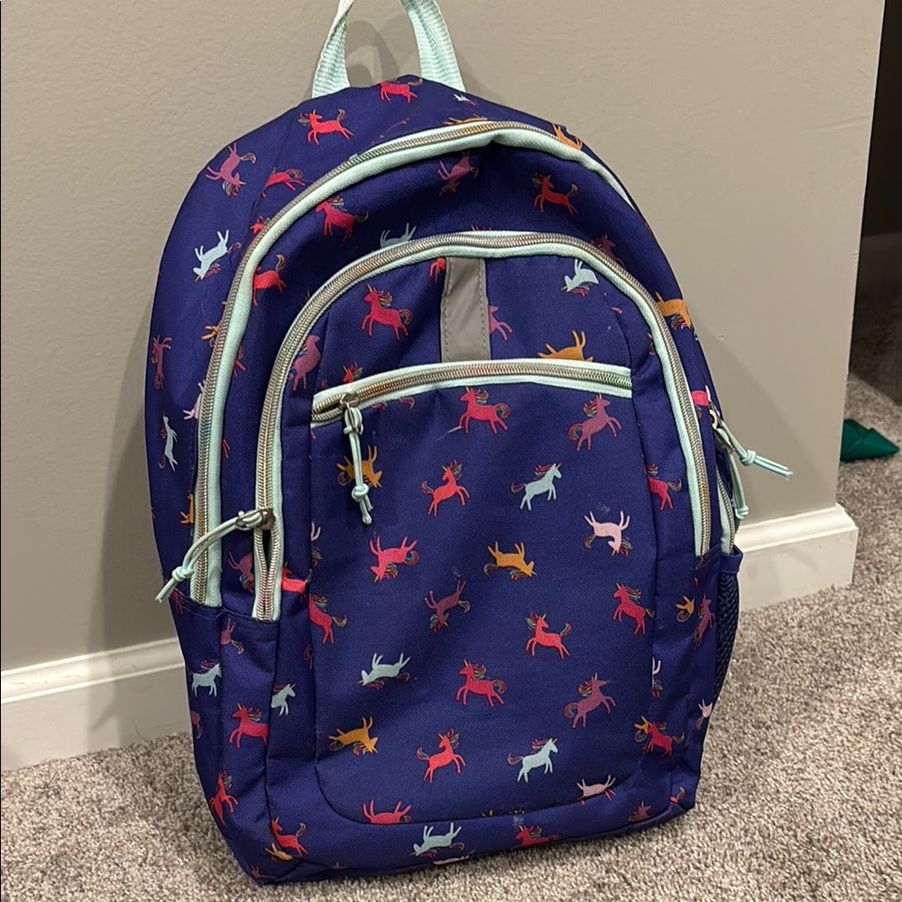 Used condition Girls' Unicorn Backpack with Mint Trim.